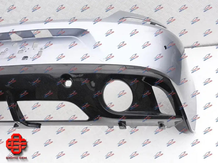 ASTON MARTIN VANQUISH V12 REAR BUMPER WITH CARBON