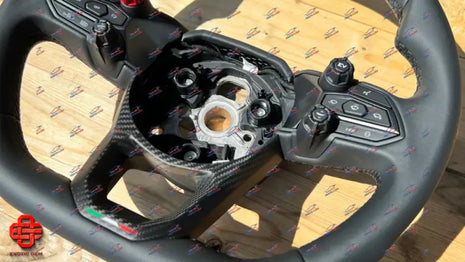 LAMBORGHINI REVUELTO STEERING WHEEL BLACK LEATHER WITH CARBON