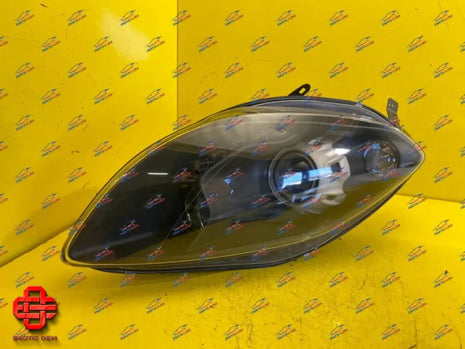 SLR STERLING MOSS HEADLIGHT R SIDE OEM PART