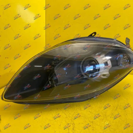 SLR STERLING MOSS HEADLIGHT R SIDE OEM PART
